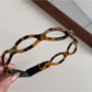 Gifty - Glossy Acetate Open Cutwork Toothed Headband