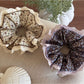 Side view of Gifty Retro Lace Floral Scrunchie highlighting lace texture and floral details
