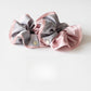 Gifty scrunchie styled on a wrist as a fashion accessory