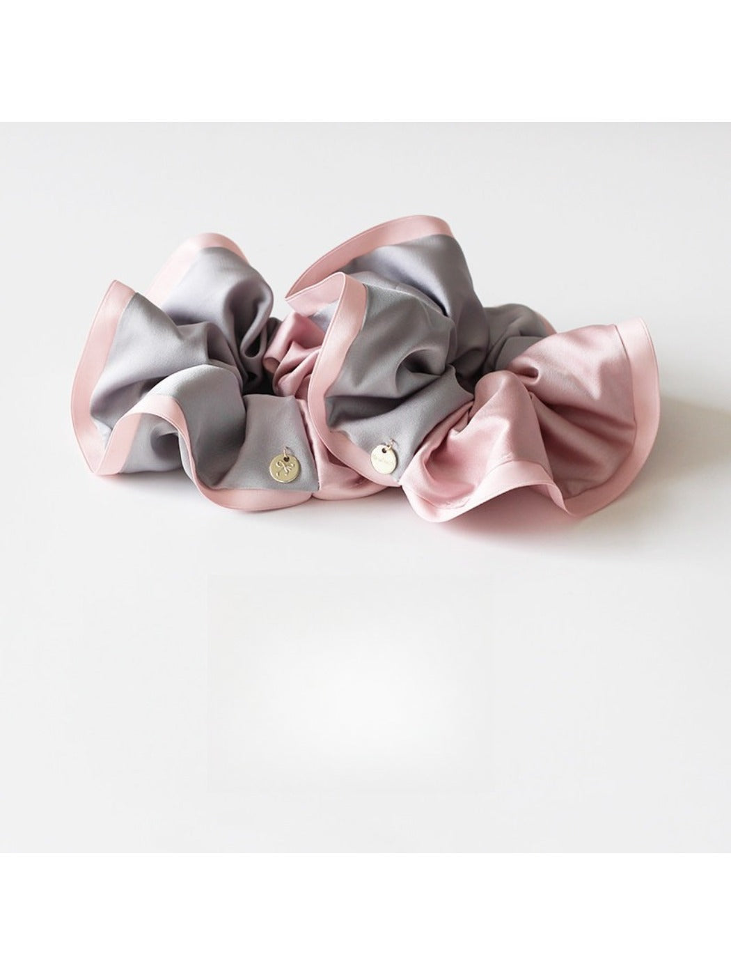 Gifty scrunchie styled on a wrist as a fashion accessory