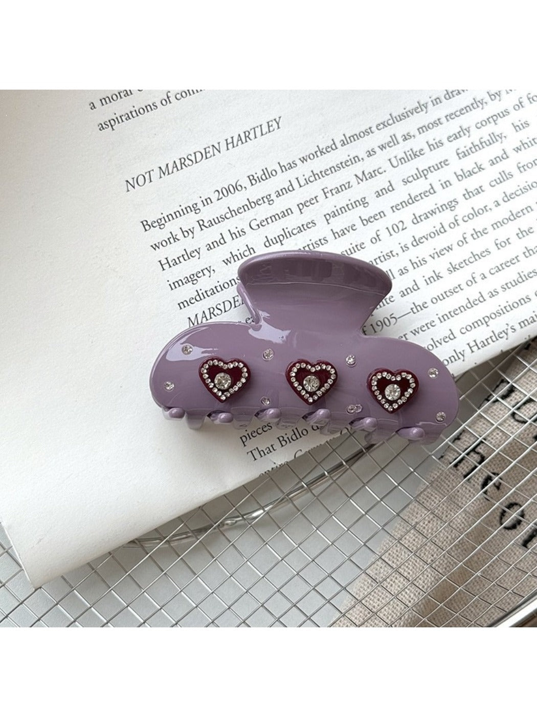 Beau Sweet Heart Shaped Acetate Hair Clip displayed from side angle showing thickness and clasp