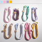 Colorful minimalist rope keychain with metal ring on white background
