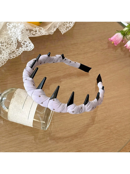 Top view of Gifty Sweet Polka Dot Headband highlighting bow shape