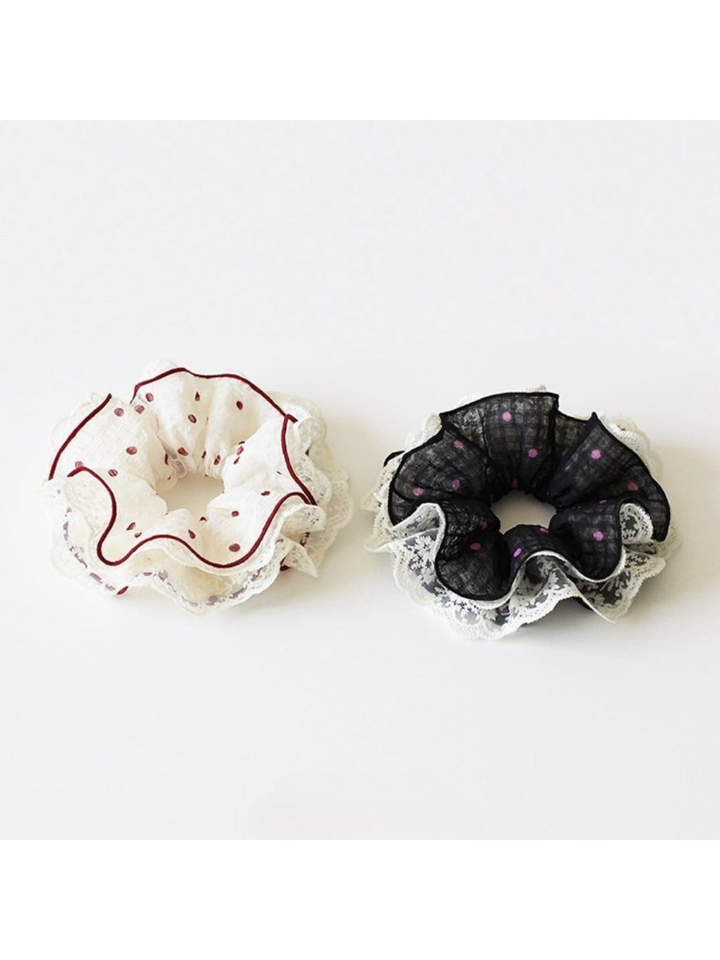 Close-up of Gifty vintage polka dot scrunchie showing ruffled texture