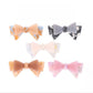 Beau hair clip worn in styled hair showcasing bow placement