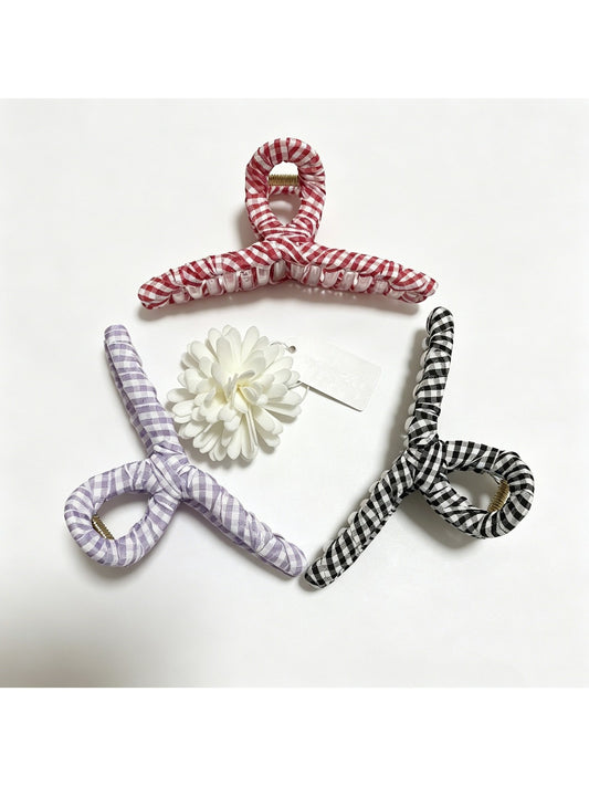 Beau colorful plaid fabric wrapped claw clip shown from front angle