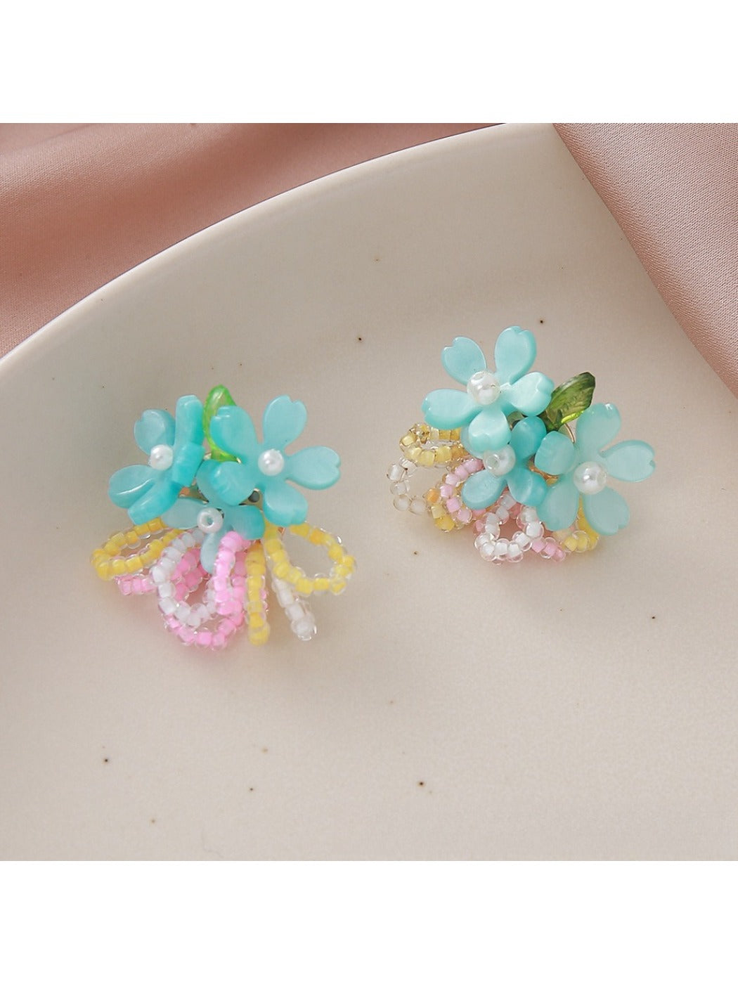 Earedge flower cluster earrings with vibrant beads arranged in floral shape