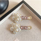 Beau Sweet Style flower hair clip attached to brown hair in a side hairstyle