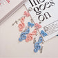 Keypus music note keychain hanging from a silver keyring