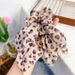 Gifty scrunchie in vintage style with soft fabric and floral design