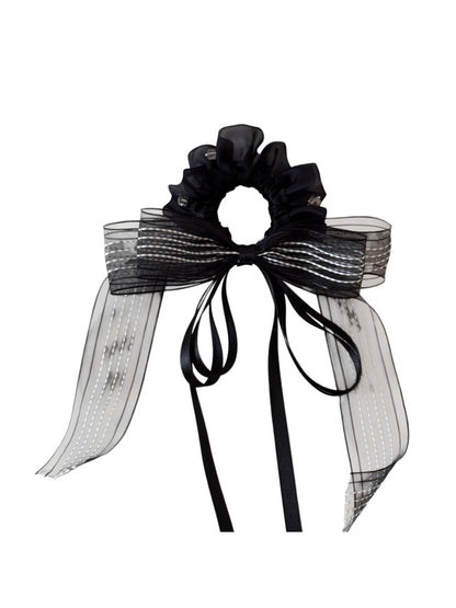 Top view of Gifty scrunchie highlighting the layered ribbon design