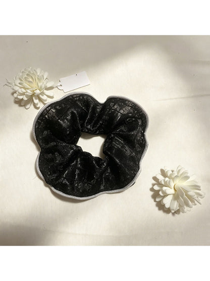 Gifty lace scrunchie displayed on a white background showing elastic band
