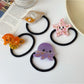 Gifty hair tie stretched to display full ocean world animal print design