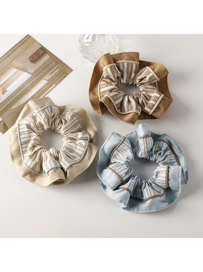 Gifty Pretty Dreamy pastel scrunchie in soft pink fabric with subtle sheen