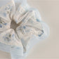 Gifty Sweet Graceful Floral Scrunchie worn on a wrist as a bracelet accessory