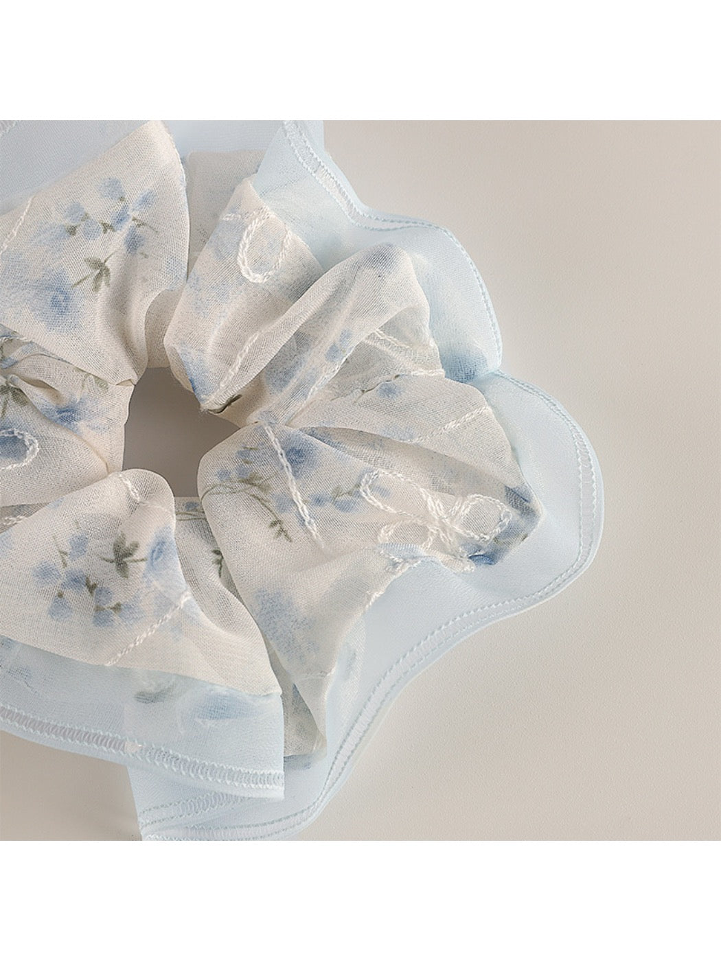 Gifty Sweet Graceful Floral Scrunchie worn on a wrist as a bracelet accessory