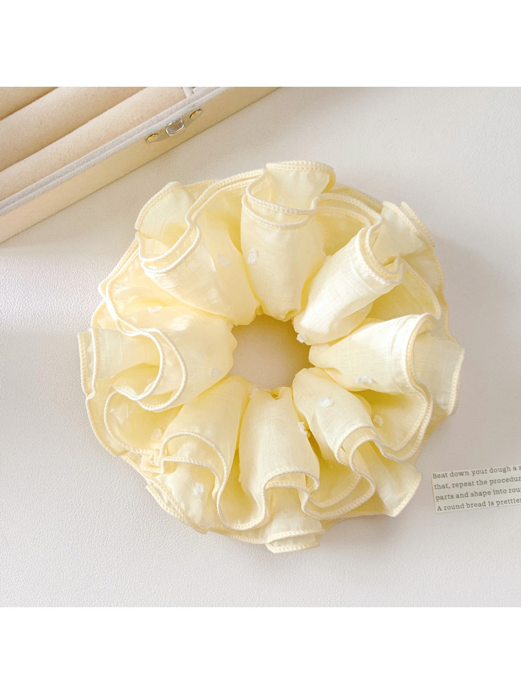 Gifty solid color four layer scrunchie in pastel pink isolated on white background