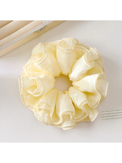 Gifty solid color four layer scrunchie in pastel pink isolated on white background