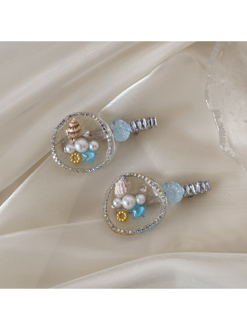 Close-up of the conch shell detail on the Beau hair clip with textured surface