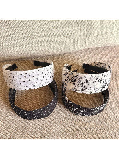 Close-up of Gifty headband showing detailed tiny floral pattern
