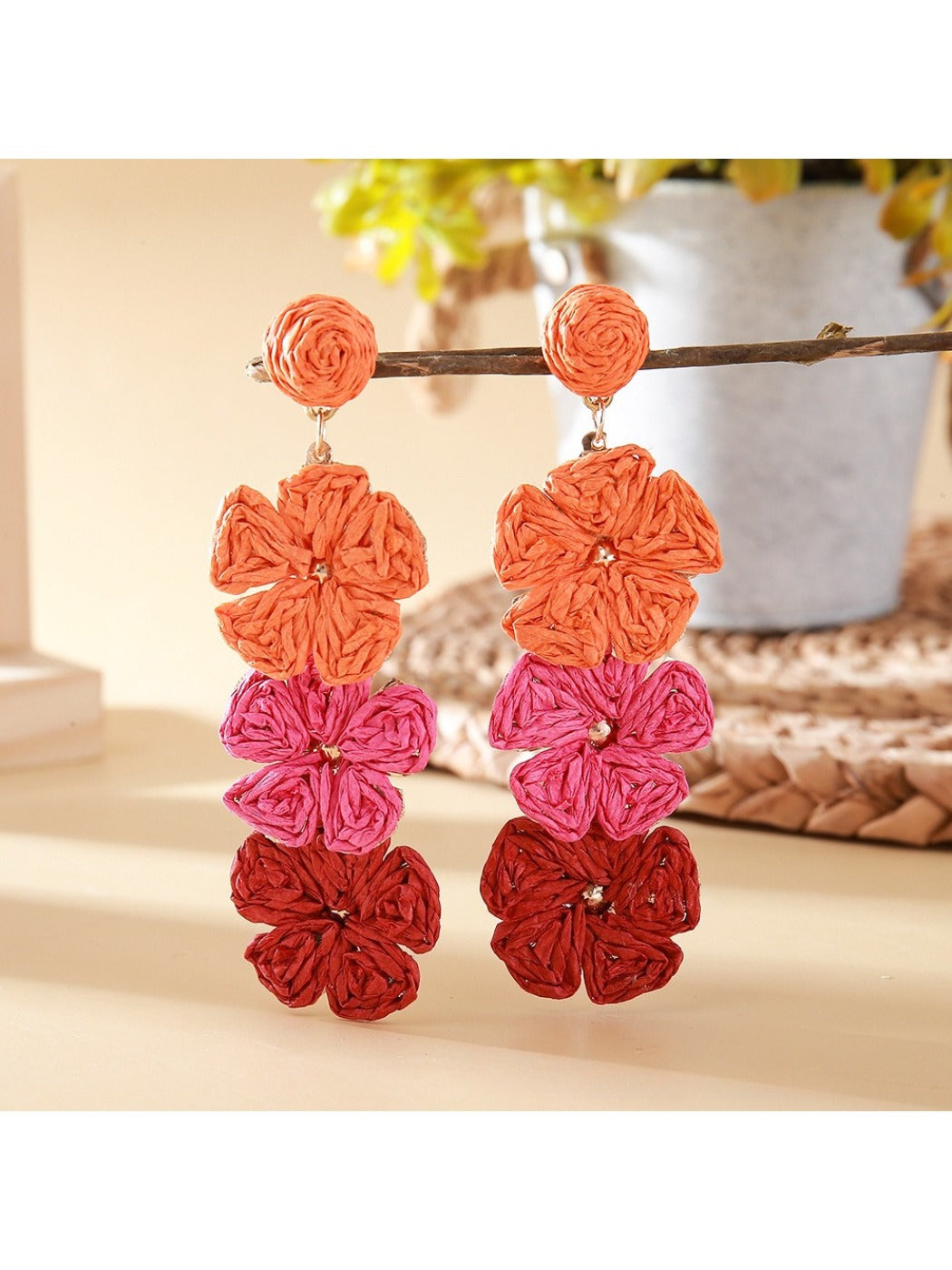 Artistic shot of colorful Bohemian drop earrings highlighting texture and colors