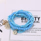 Lovra bracelet styled with casual outfit on model's wrist featuring leaf pendant