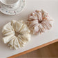Close-up of Gifty fashionable printed ruched scrunchie in floral pattern