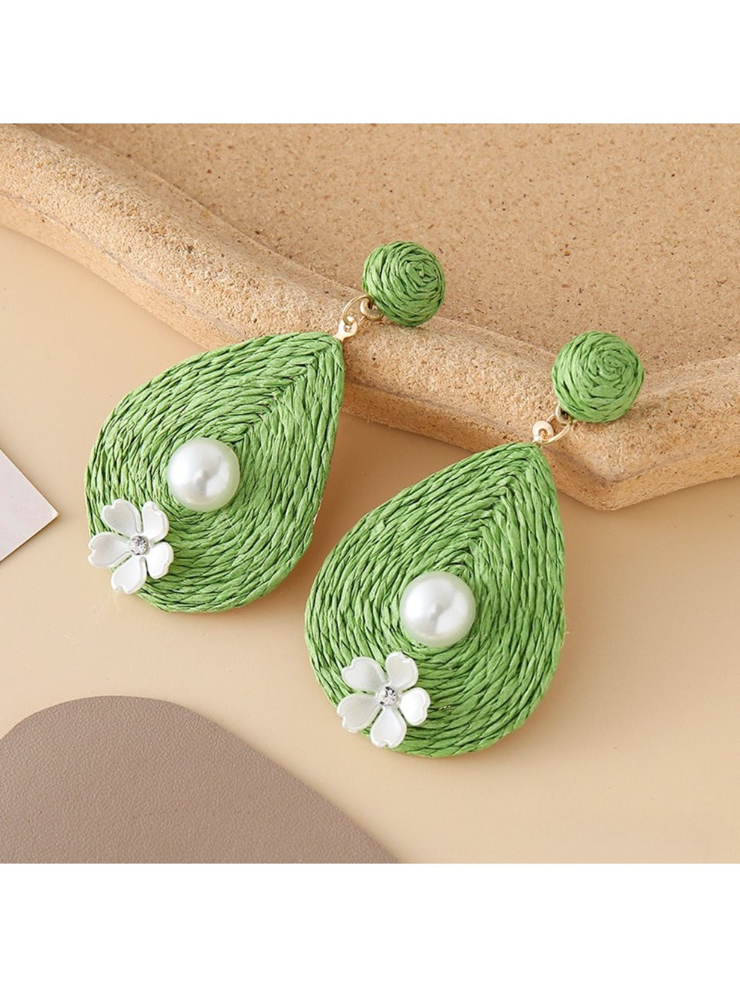 Earedge teardrop drop earrings styled with matching necklace and bracelet