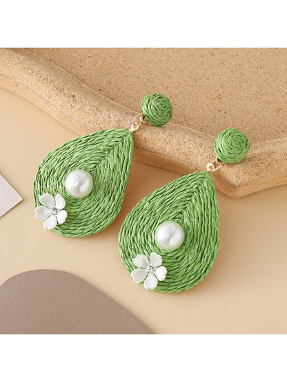Earedge teardrop drop earrings styled with matching necklace and bracelet