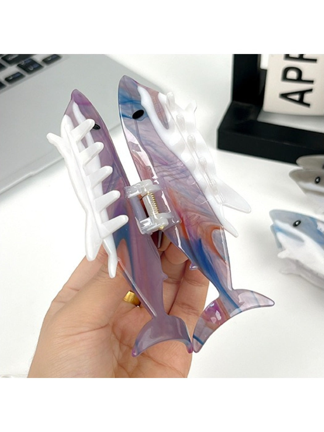 Side view of Beau minimalist shark hair claw clip highlighting curved teeth