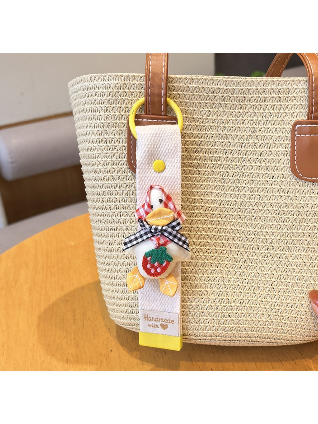 Keypus duck charm keychain displayed on a white background with soft shadows