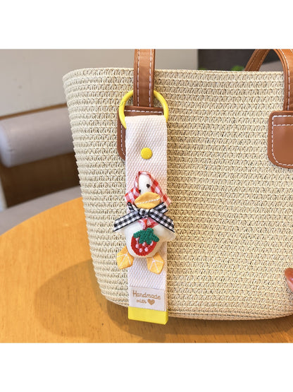 Keypus duck charm keychain displayed on a white background with soft shadows