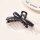 Beau - Curved Plastic Bow Hair Styling Claw Clip