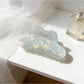 Beau holographic mermaid claw clip angled to show prong details