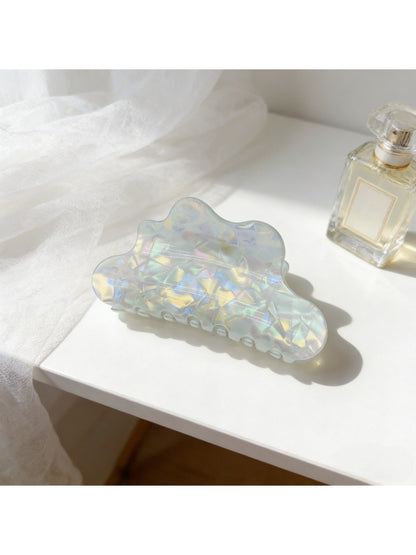Beau holographic mermaid claw clip angled to show prong details