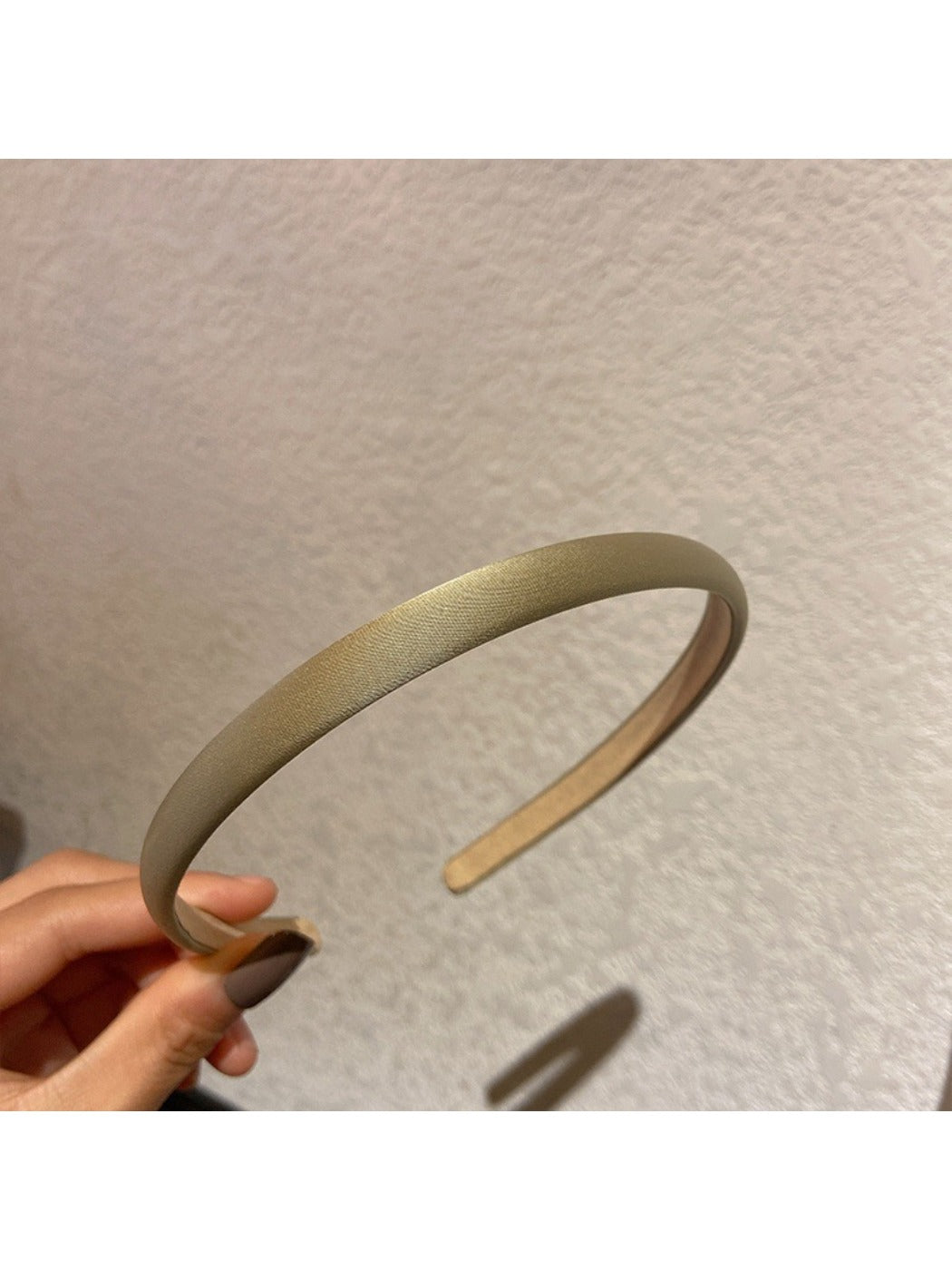Candy color satin headband in pastel green on white background