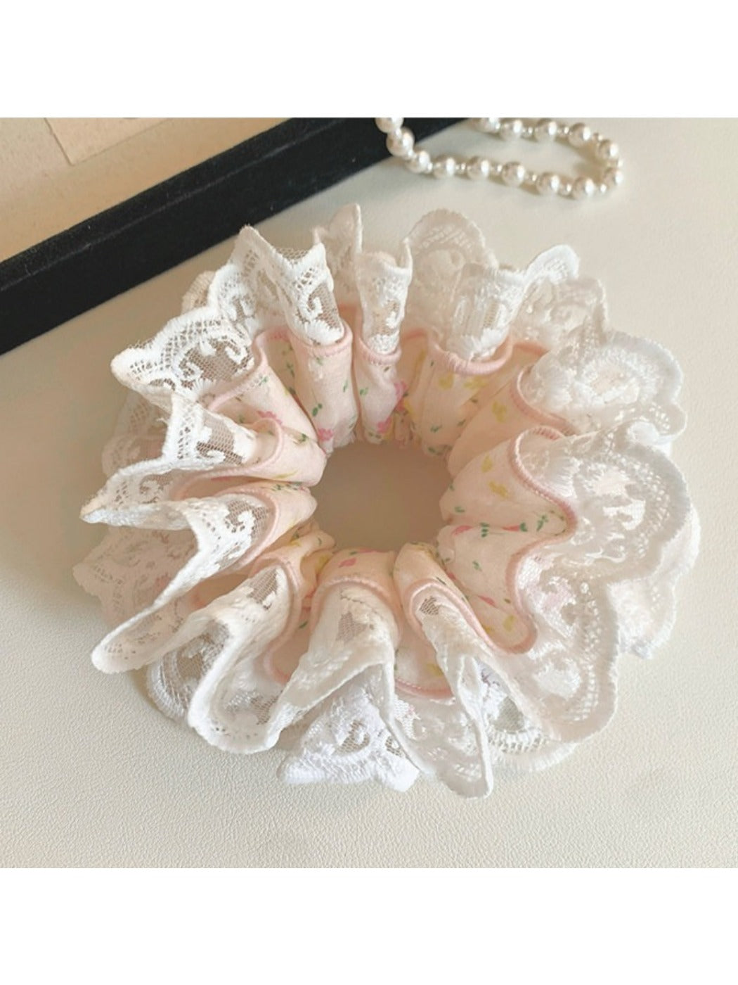 Model wearing Gifty sweet light pink scrunchie in hair