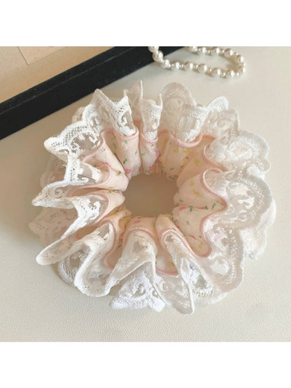 Model wearing Gifty sweet light pink scrunchie in hair