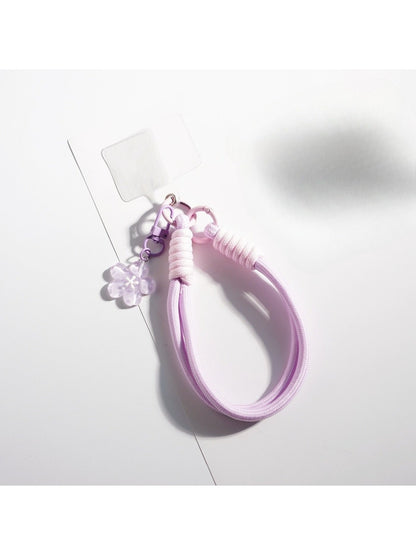 Top view of the colorful flower-shaped rope keychain highlighting petal arrangement