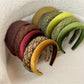 Side view of Gifty classic headband showing its curved shape
