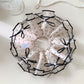 Side view of Gifty satin polka dot bow scrunchie showing bow detail