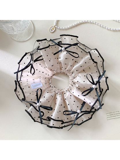 Side view of Gifty satin polka dot bow scrunchie showing bow detail