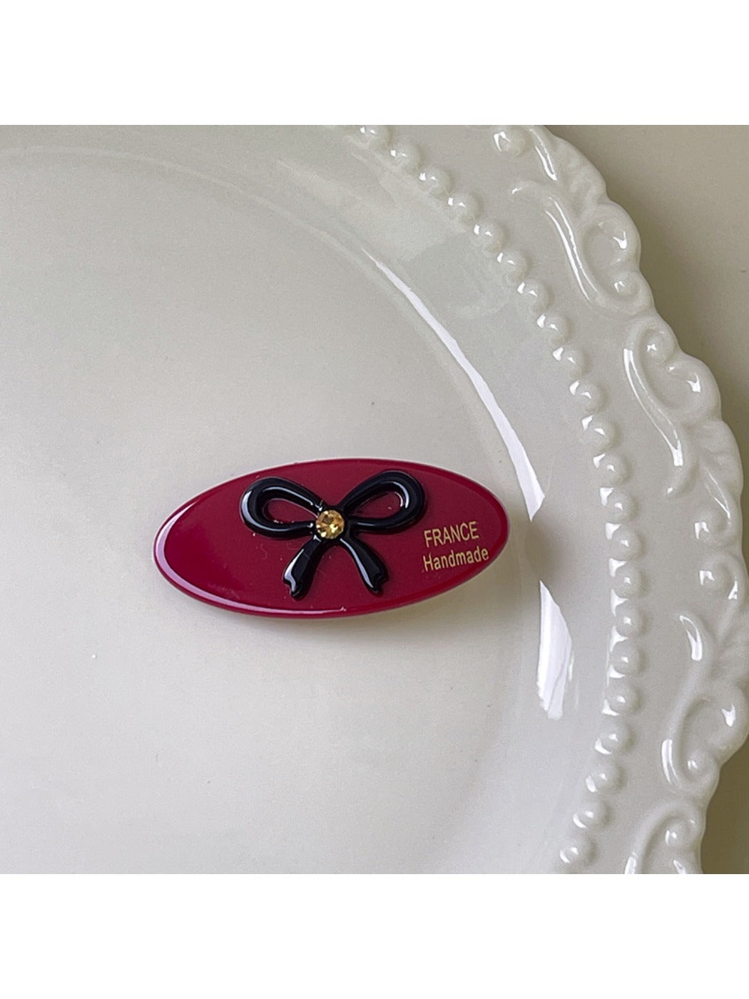 Beau minimalist hair clip displayed with packaging in background