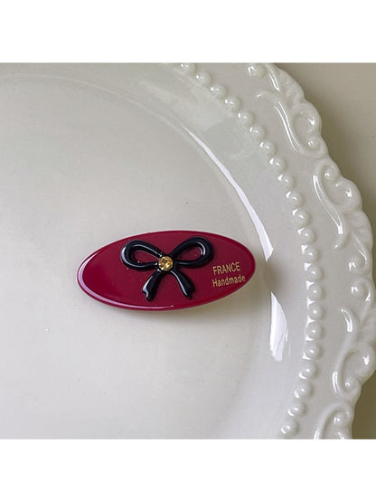 Beau minimalist hair clip displayed with packaging in background