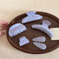 Beau gentle blue hair clip displayed on a white background