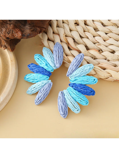 Earedge raffia earrings in blue and natural shades with gold-tone earring hooks