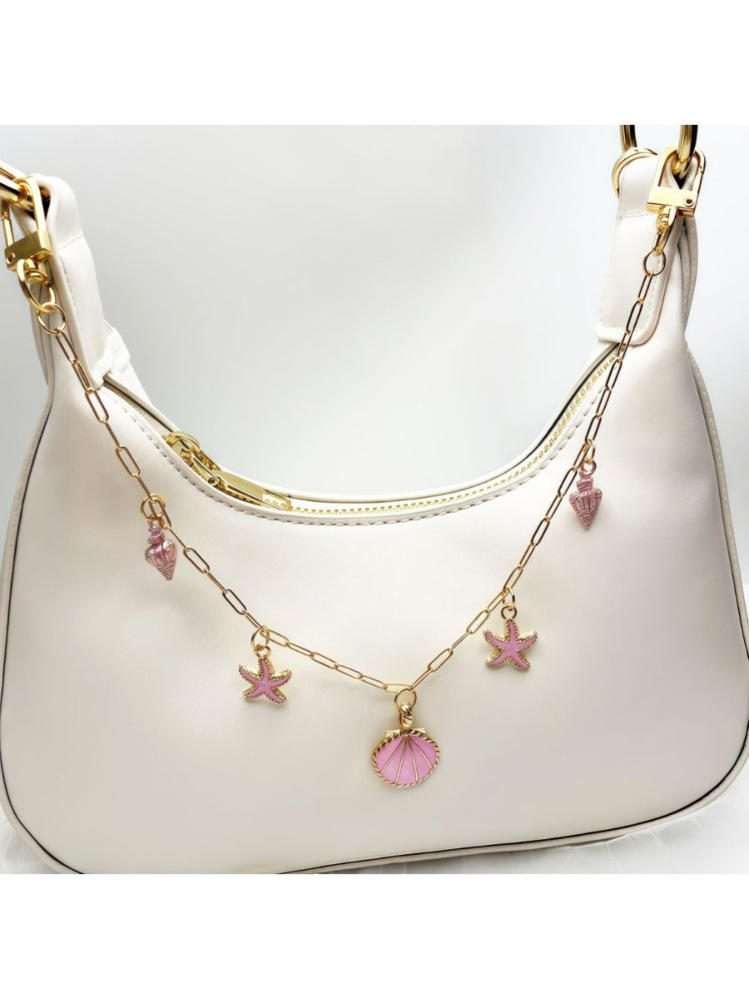 Side view of the minimalist marine charm showing detailed rope knot and anchor
