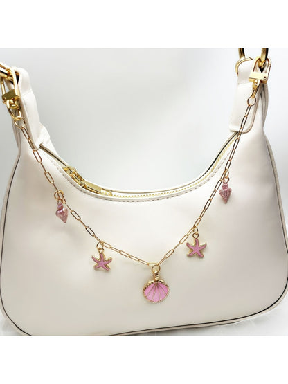 Side view of the minimalist marine charm showing detailed rope knot and anchor