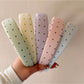 Gifty joyful polka dot colored headband displayed on white background