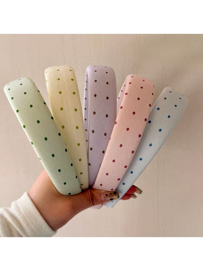 Gifty joyful polka dot colored headband displayed on white background